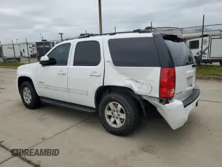 2014 GMC Yukon SLT with VIN 1GKS1CE05ER249398, listed as a Copart auction lot 47493915 with 139,824 mi miles and Salvage Title. Bid and sale history available at carsss.com. Image 2.