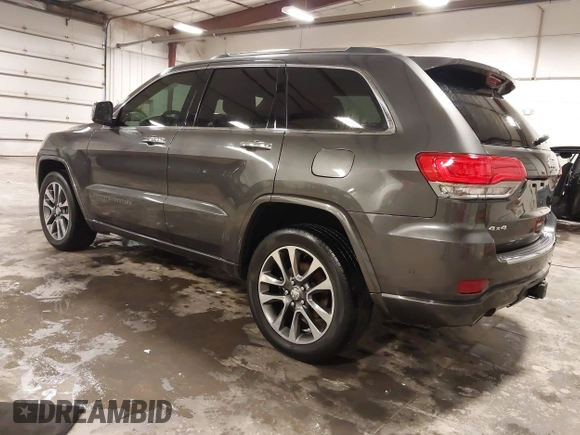 2017 Jeep Grand Cherokee Overland z VIN 1C4RJFCG6HC641812, wystawiony jako IAAI lot #42053404 z przebiegiem 129 184 mil mil oraz . Historia ofert i sprzedaży dostępna na DreamBid. Obrazek 3.