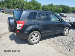 2009 Suzuki Grand Vitara with VIN JS3TD047994100405, listed as a Copart auction lot 62215355 with 127,756 mi miles and Clean title. Bid and sale history available at DreamBid. Image 3.