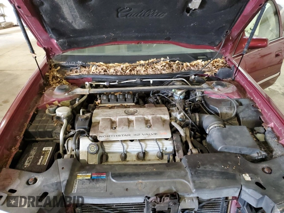 1998 Cadillac DeVille z VIN 1G6KD54Y3WU754718, wystawiony jako Copart lot #60068175 z przebiegiem 64 498 mil mil oraz Czysty tytuł • Clean title. Historia ofert i sprzedaży dostępna na DreamBid. Obrazek 11.
