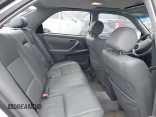 1999 Toyota Camry LE z VIN 4T1BF28K4XU931902, wystawiony jako IAAI lot #41707824 z przebiegiem 171 224 mil mil oraz . Historia ofert i sprzedaży dostępna na DreamBid. Obrazek 8.