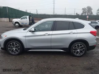 2021 BMW X1 xDrive28i with VIN WBXJG9C04M5T79810, listed as a IAAI auction lot 41471536 with 75,345 mi miles. Bid and sale history available at carsss.com. Image 14.