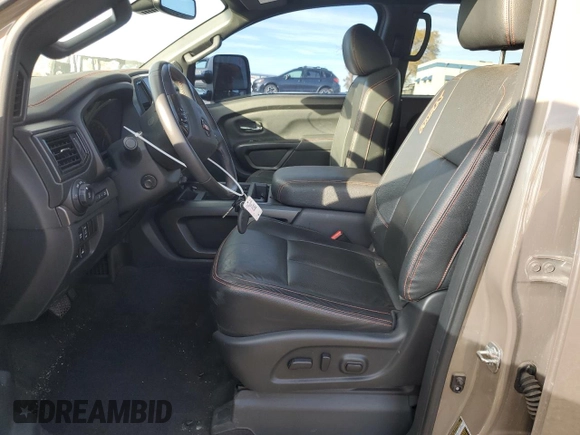 2021 Nissan Titan SV z VIN 1N6AA1FB9MN533034, wystawiony jako Copart lot #81335494 z przebiegiem 71 281 mil mil oraz Szkoda całkowita • Salvage title. Historia ofert i sprzedaży dostępna na DreamBid. Obrazek 7.