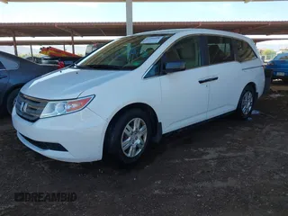 2013 Honda Odyssey LX with VIN 5FNRL5H2XDB028879, listed as a IAAI auction lot 41958988 with 49,868 mi miles and . Bid and sale history available at carsss.com. Image 2.