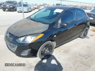 2013 Mazda 2 Sport with VIN JM1DE1KY8D0164937, listed as a IAAI auction lot 41633364 with 134,984 mi miles and . Bid and sale history available at carsss.com. Image 2.