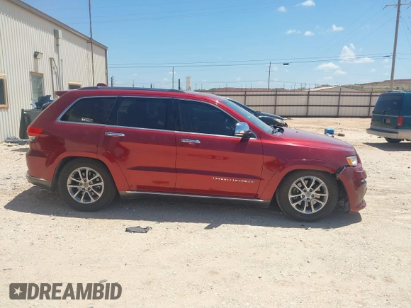 2014 Jeep Grand Cherokee Summit with VIN 1C4RJFJT1EC237358, listed as a IAAI auction lot 42602245 with 106,821 mi miles and . Bid and sale history available at DreamBid. Image 13.