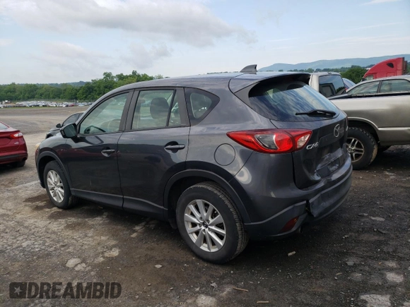 2014 Mazda CX-5 Sport with VIN JM3KE2BE9E0372370, listed as a Copart auction lot 58980165 with 175,477 mi miles and Salvage title. Bid and sale history available at DreamBid. Image 2.