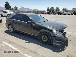 2014 Mercedes-Benz C 250 Sport with VIN WDDGF4HB7EA963401, listed as a Copart auction lot 54152815 with 155,264 mi miles and Salvage title. Bid and sale history available at DreamBid. Image 4.