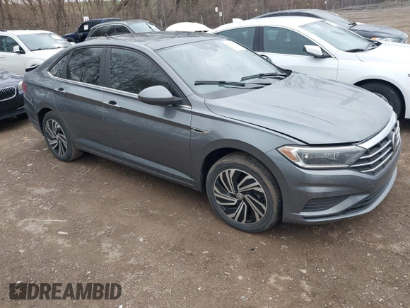 2021 Volkswagen Jetta SEL z VIN 3VWE57BU5MM086681, wystawiony jako IAAI lot #41832830 z przebiegiem 37 398 mil mil oraz . Historia ofert i sprzedaży dostępna na DreamBid. Obrazek 1.