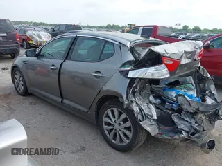2015 Kia Optima EX with VIN 5XXGN4A70FG442402, listed as a IAAI auction lot 42260968 with 94,512 mi miles and . Bid and sale history available at DreamBid. Image 3.