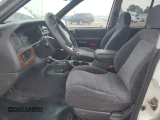 1997 Jeep Grand Cherokee Laredo with VIN 1J4GZ58S2VC676652, listed as a Copart auction lot 64939974 with 256,923 mi miles and Salvage Title. Bid and sale history available at carsss.com. Image 7.