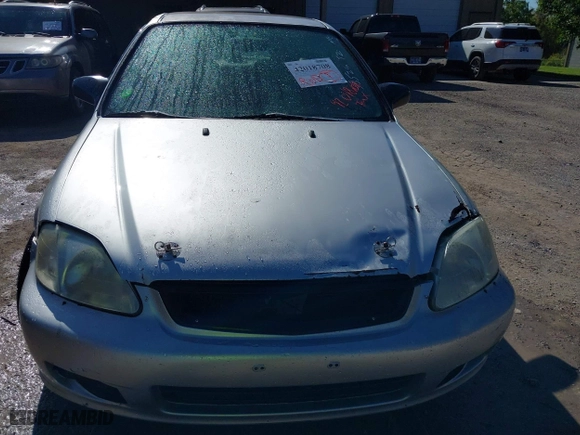 1999 Honda Civic VP with VIN 2HGEJ6616XH537100, listed as a IAAI auction lot 42018708 with 229,594 mi miles. Bid and sale history available at carsss.com. Image 6.
