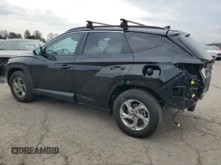 2024 Hyundai Tucson SEL with VIN 5NMJBCDE7RH416985, listed as a Copart auction lot 49323035 with 7,450 mi miles and Salvage Title. Bid and sale history available at carsss.com. Image 2.