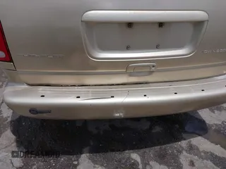 1999 Chrysler Town & Country LXi with VIN 1C4GP54L0XB512495, listed as a IAAI auction lot 39677461 with 284,495 mi miles. Bid and sale history available at carsss.com. Image 12.