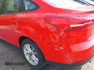 2015 Ford Focus SE with VIN 1FADP3F29FL244041, listed as a IAAI auction lot 42053303 with 132,804 mi miles and . Bid and sale history available at DreamBid. Image 6.