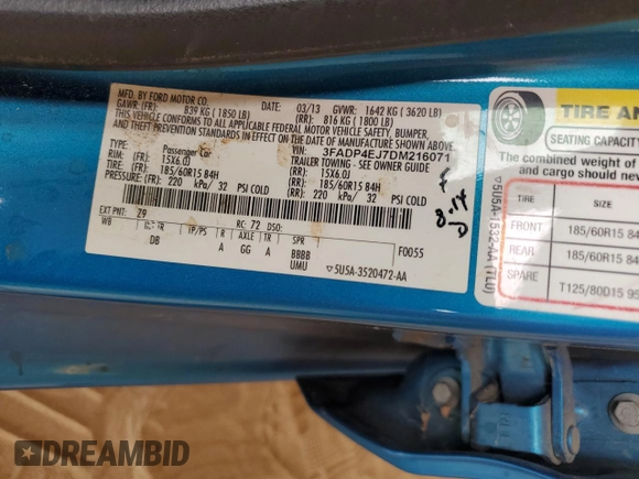 2013 Ford Fiesta SE z VIN 3FADP4EJ7DM216071, wystawiony jako Copart lot #58629155 z przebiegiem 73 407 mil mil oraz Szkoda całkowita • Salvage title. Historia ofert i sprzedaży dostępna na DreamBid. Obrazek 13.