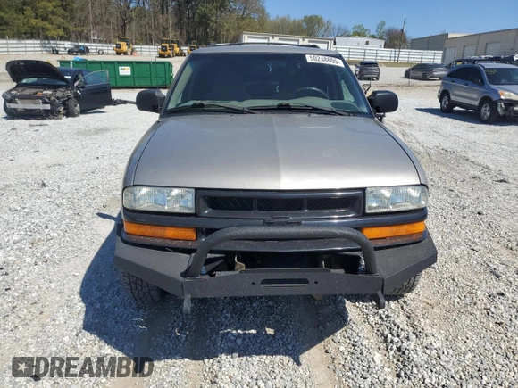 2004 Chevrolet Blazer LS z VIN 1GNDT13X54K166622, wystawiony jako Copart lot #50248605 z przebiegiem 198 301 mil mil oraz Szkoda całkowita • Salvage title. Historia ofert i sprzedaży dostępna na DreamBid. Obrazek 5.