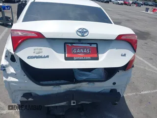 2018 Toyota Corolla L with VIN 5YFBURHE7JP810444, listed as a IAAI auction lot 42558647 with 74,794 mi miles and . Bid and sale history available at DreamBid. Image 6.