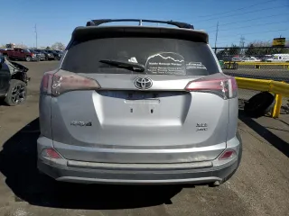 2018 Toyota RAV4 XLE with VIN JTMRFREV6JD244065, listed as a Copart auction lot 49099265 with 121,698 mi miles and Salvage Title. Bid and sale history available at carsss.com. Image 6.