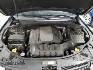 2014 Jeep Grand Cherokee Overland with VIN 1C4RJFCT9EC264594, listed as a Copart auction lot 50071695 with 124,712 mi miles and Clean Title. Bid and sale history available at DreamBid. Image 12.