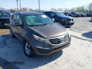 2011 Kia Sportage LX z VIN KNDPB3A21B7029298, wystawiony jako IAAI lot #41981046 z przebiegiem 121 973 mil mil oraz . Historia ofert i sprzedaży dostępna na DreamBid. Obrazek 1.
