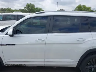 2022 Volkswagen Atlas SEL R-Line z VIN 1V2AR2CA7NC550648, wystawiony jako IAAI lot #41974370 z przebiegiem 48 378 mil mil oraz . Historia ofert i sprzedaży dostępna na DreamBid. Obrazek 14.