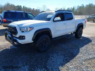 2018 Toyota Tacoma SR with VIN 5TFCZ5AN4JX164600, listed as a IAAI auction lot 41646488 with 87,349 mi miles. Bid and sale history available at carsss.com. Image 2.