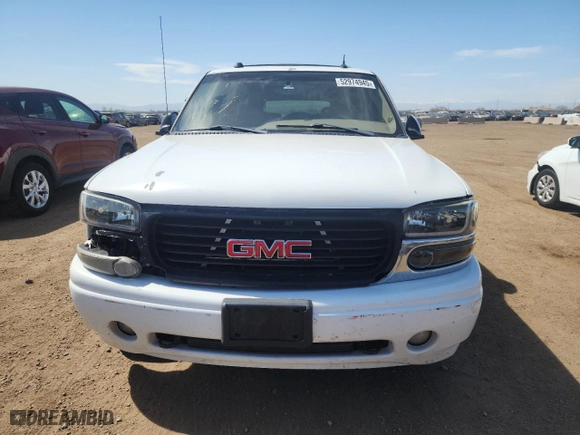 2004 GMC Yukon XL Denali with VIN 1GKFK66U44J258379, listed as a Copart auction lot 52974945 with 167,524 mi miles and Salvage Title. Bid and sale history available at carsss.com. Image 5.
