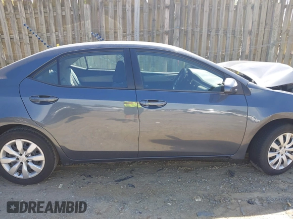 2016 Toyota Corolla L z VIN 5YFBURHE9GP526077, wystawiony jako IAAI lot #42300498 z przebiegiem 174 275 mil mil oraz . Historia ofert i sprzedaży dostępna na DreamBid. Obrazek 13.