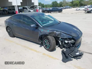 2024 Tesla Model 3 z VIN 5YJ3E1EAXRF864719, wystawiony jako IAAI lot #42129944 z przebiegiem 3776 mil mil oraz . Historia ofert i sprzedaży dostępna na DreamBid. Obrazek 1.