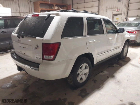 2007 Jeep Grand Cherokee Limited with VIN 1J8HR58217C552426, listed as a IAAI auction lot 41834106 with 130,537 mi miles. Bid and sale history available at carsss.com. Image 4.