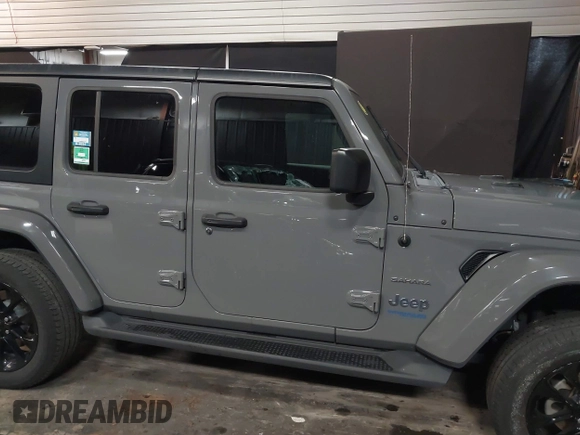 2022 Jeep Wrangler Unlimited Sahara with VIN 1C4JJXP66NW198723, listed as a IAAI auction lot 41368728 with 31,814 mi miles and . Bid and sale history available at DreamBid. Image 13.