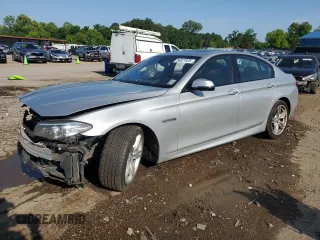2016 BMW 5 Series 535i with VIN WBA5B1C57GG133690, listed as a Copart auction lot 54921975 with 135,748 mi miles and Salvage title. Bid and sale history available at DreamBid. Image 1.