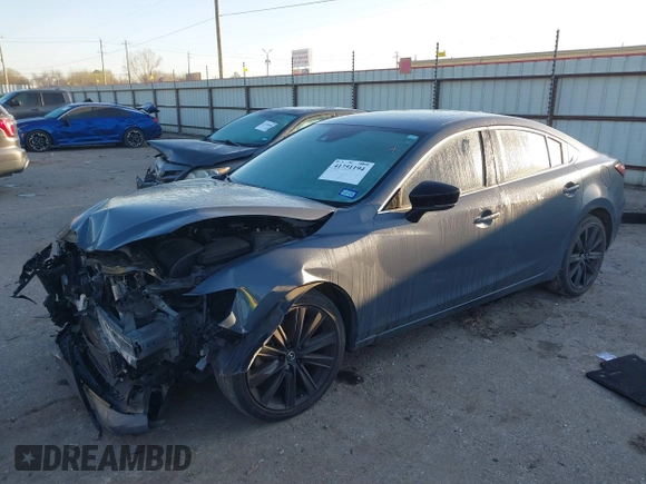 2021 Mazda 6 Carbon Edition with VIN JM1GL1WY9M1619981, listed as a IAAI auction lot 41751194 with 32,083 mi miles and . Bid and sale history available at DreamBid. Image 17.