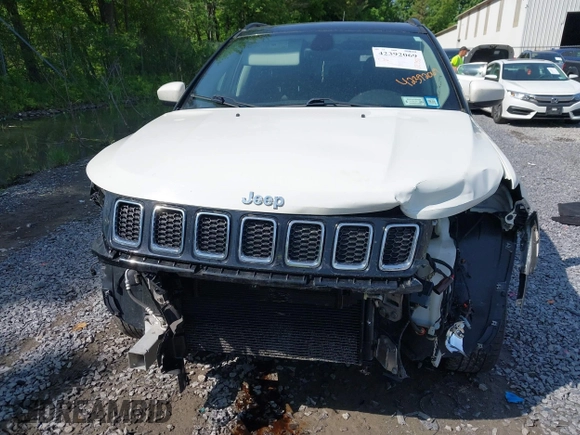2018 Jeep Compass Latitude z VIN 3C4NJDBB2JT281182, wystawiony jako IAAI lot #42392069 z przebiegiem 112 758 mil mil oraz . Historia ofert i sprzedaży dostępna na DreamBid. Obrazek 6.