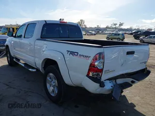 2015 Toyota Tacoma PreRunner with VIN 3TMKU4HN6FM044238, listed as a IAAI auction lot 41534623 with 196,490 mi miles and . Bid and sale history available at DreamBid. Image 3.