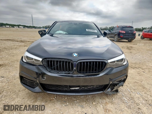 2018 BMW 5 Series 540i xDrive with VIN WBAJE7C52JWD52730, listed as a Copart auction lot 60297425 with 104,208 mi miles and Salvage title. Bid and sale history available at DreamBid. Image 5.