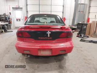 1999 Pontiac Sunfire SE z VIN 1G2JB524XX7547651, wystawiony jako IAAI lot #41962158 z przebiegiem 130 385 mil mil oraz . Historia ofert i sprzedaży dostępna na DreamBid. Obrazek 16.