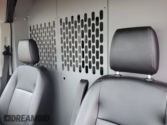 2023 Ford Transit Cargo с VIN 1FTBW9C89PKB88609, выставлен на аукционе Copart как лот 54909845 с пробегом 25 083 миль миль и Списание • Salvage title. История ставок и продаж доступна на DreamBid. Изображение 10.