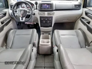 2012 Volkswagen Routan SE with VIN 2C4RVABG4CR390524, listed as a Copart auction lot 63058185 with 146,380 mi miles and Salvage title. Bid and sale history available at DreamBid. Image 8.