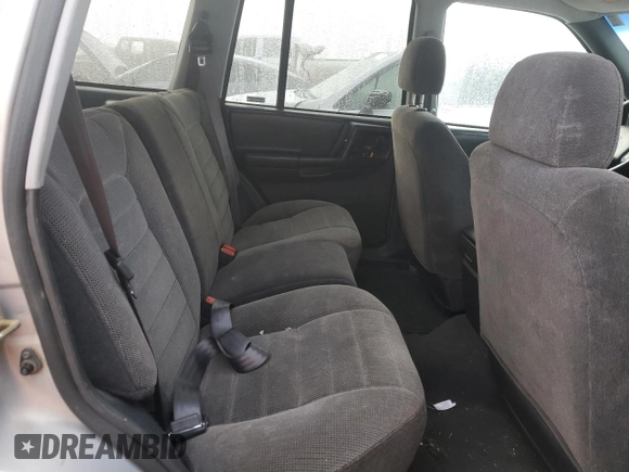 1997 Jeep Grand Cherokee Laredo with VIN 1J4GZ58Y6VC603370, listed as a Copart auction lot 82802794 with 0 mi miles and Salvage Title. Bid and sale history available at carsss.com. Image 10.