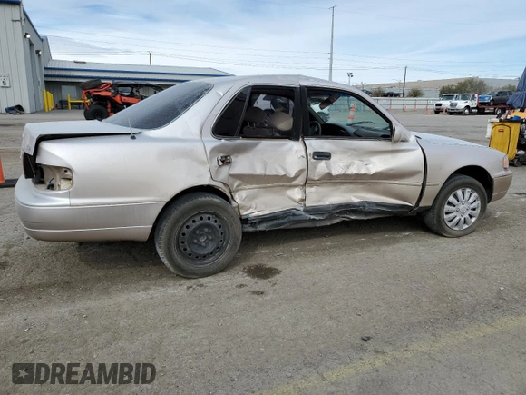 1996 Toyota Camry DX with VIN 4T1BG12K0TU809838, listed as a Copart auction lot 48985365 with 194,822 mi miles and Salvage Title. Bid and sale history available at carsss.com. Image 3.