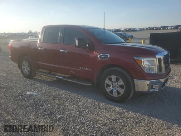2017 Nissan Titan SV with VIN 1N6AA1E67HN557309, listed as a Copart auction lot 53748735 with 112,197 mi miles and Salvage title. Bid and sale history available at DreamBid. Image 4.