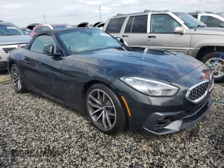 2022 BMW Z4 sDrive30i with VIN WBAHF3C04NWX42062, listed as a Copart auction lot 74989854 with 0 mi miles and Salvage Title. Bid and sale history available at carsss.com. Image 4.