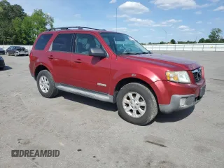 2008 Mazda Tribute Touring with VIN 4F2CZ96108KM14483, listed as a Copart auction lot 55091955 with 133,397 mi miles and Salvage Title. Bid and sale history available at DreamBid. Image 4.