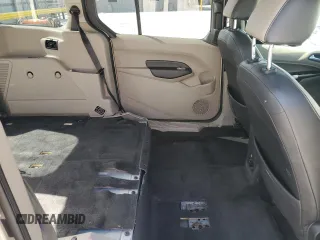 2015 Ford Transit Connect XLT with VIN NM0GS9F77F1185066, listed as a Copart auction lot 52049115 with 85,359 mi miles and Salvage title. Bid and sale history available at DreamBid. Image 11.