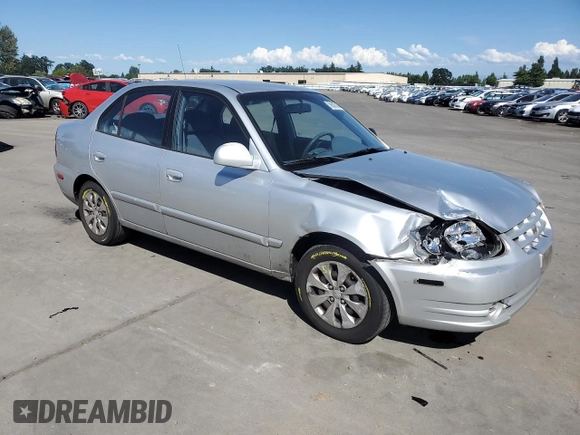 2005 Hyundai Accent GLS with VIN KMHCG45C55U623340, listed as a Copart auction lot 59587304 with 275,364 mi miles and Salvage Title. Bid and sale history available at carsss.com. Image 4.