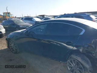 2023 Mazda 3 S Select with VIN 3MZBPABM2PM373880, listed as a IAAI auction lot 41702395 with 20,637 mi miles and . Bid and sale history available at DreamBid. Image 14.