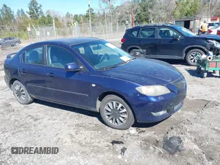 2006 Mazda 3 i Touring with VIN JM1BK32F561494865, listed as a IAAI auction lot 41637307 with 157,317 mi miles and . Bid and sale history available at DreamBid. Image 1.