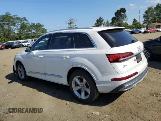 2020 Audi Q7 Premium z VIN WA1AJAF7XLD011977, wystawiony jako Copart lot #70385804 z przebiegiem 87 468 mil mil oraz Szkoda całkowita • Salvage title. Historia ofert i sprzedaży dostępna na DreamBid. Obrazek 2.